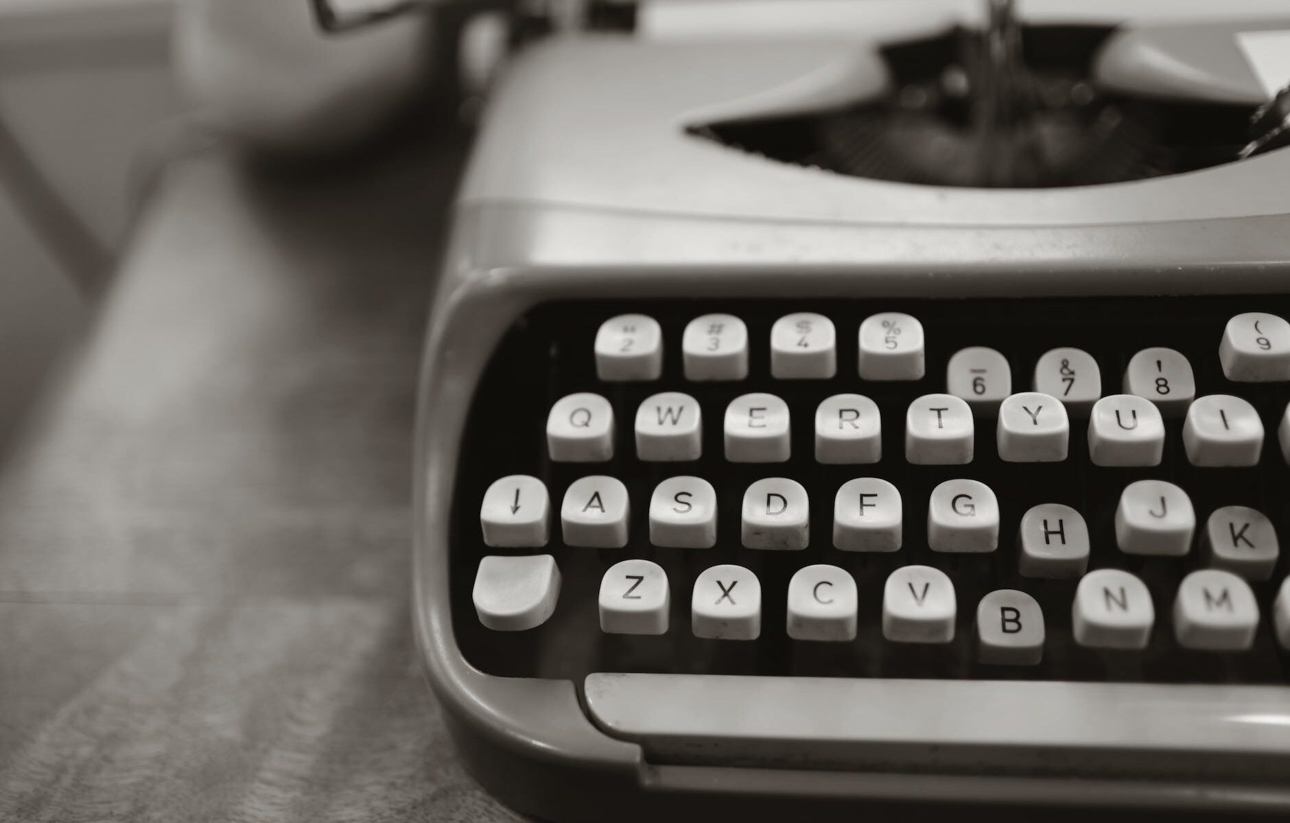 close up photo of gray typewriter